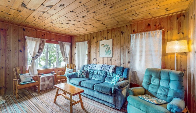Charming lakefront cottage with large yard, dock, & fire pit - close to downtown