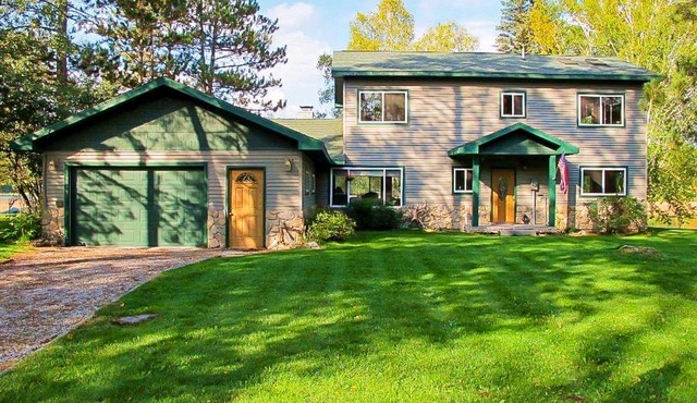 Charming Lakefront home with dock, kayaks, fireplace and patio