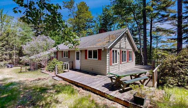 Charming Lakefront Retreat with Canoes, Kayaks, and Modern Comforts