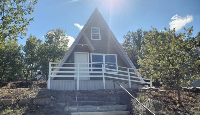 Charming Lakeside Cabin with Fire Pit & Private Dock Near Lake Cisco, Cisco, TX
