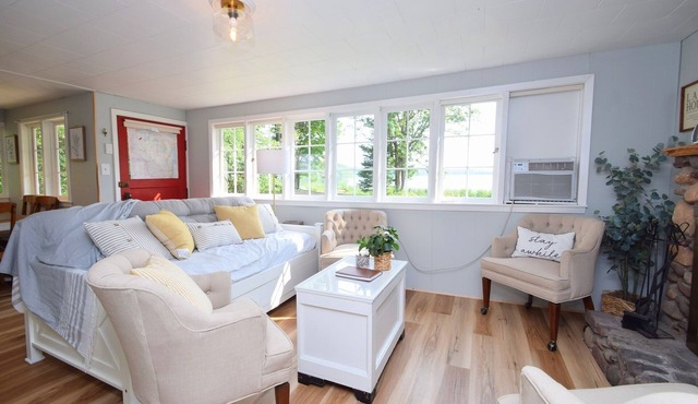 Charming Lakeside Cottage nestled on 40 private, wooded acres on Big Sand Lake