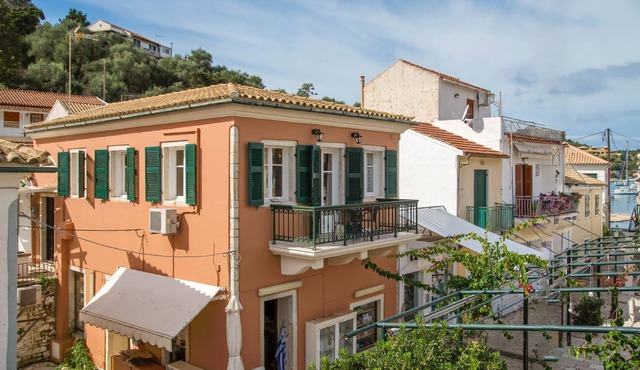 Charming Lakka Retreat: Angelina Apartment with A/C and Central Square Balcony