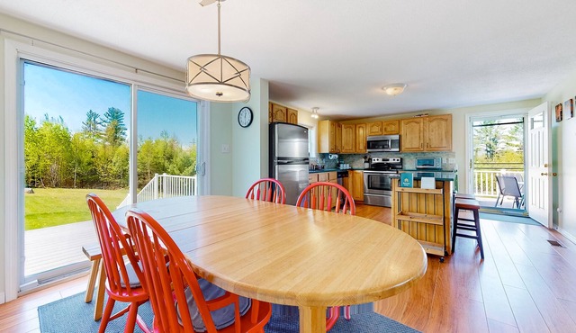 Charming Landaff home with a deck, firepit, fireplace, partial AC, and W/D