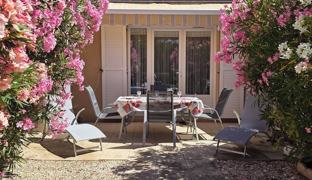 Charming little house in residence with swimming pool.