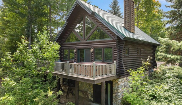 Charming Log Cabin Just Steps from the Slopes at Boyne Mountain