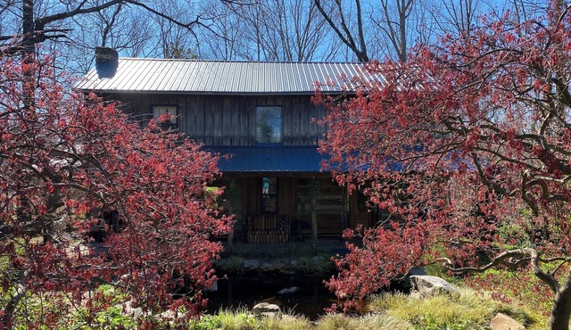 Charming Log Cabin Retreat with Flower Garden
