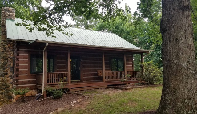 Charming Log Home with Pond on 27 Acres with Mountain Views