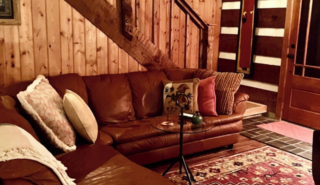 Charming log home with acres of hiking trails