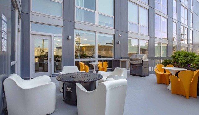 Charming Logan Square 1BR w/Roof Deck & Gym, 1 block to L, by Blueground