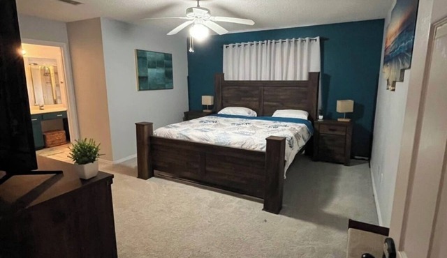Charming master bedroom in a fully furnished 4 bedroom rental house in Niceville