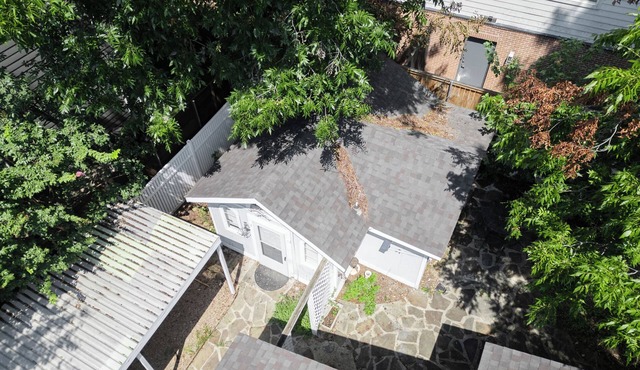 Charming Modern 4BR Home - Lux - Backyard.