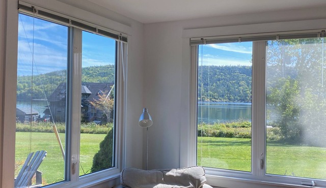 Charming Modern Cottage with water views and private Spa. Quiet Coastal Location