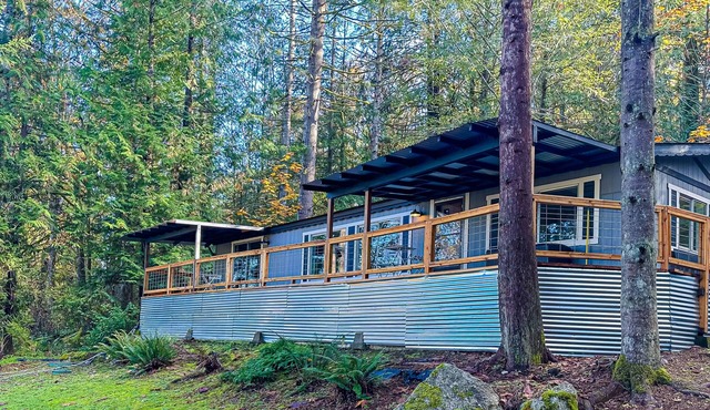 Charming modern farmhouse with water views, fire pit, bbq grill