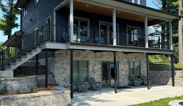 Charming new lake house with beautiful views. Pier for swimming and fishing.