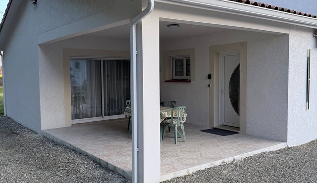 Charming new T3 ground floor with garden, terrace, shared parking and swimming pool.