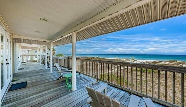 Charming Pet Friendly Beach Front Cottage with Unobstructed Sunset Views!