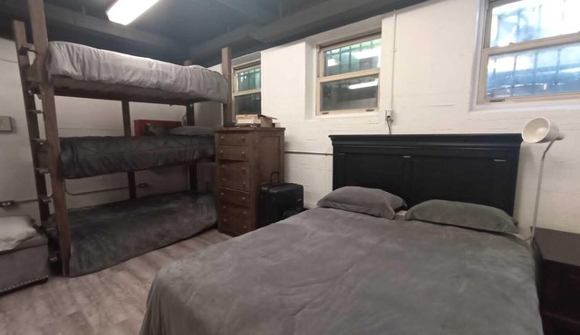 Charming Prohibition-Era Speakeasy Lounge with Bedroom and Commercial Kitchen