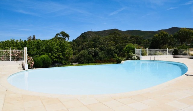 Charming residence with waterfront pool.