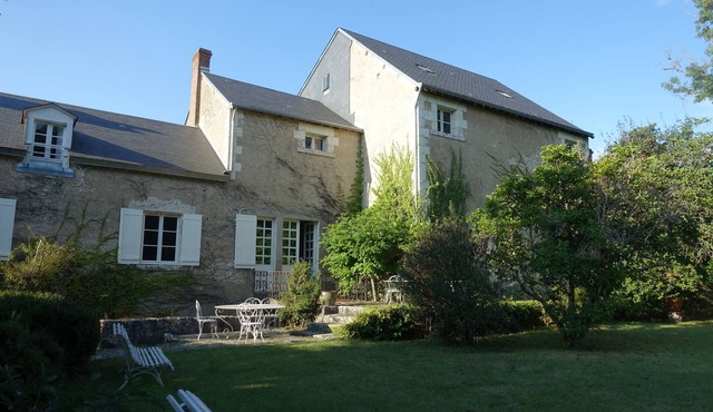 Charming riverside mill with island