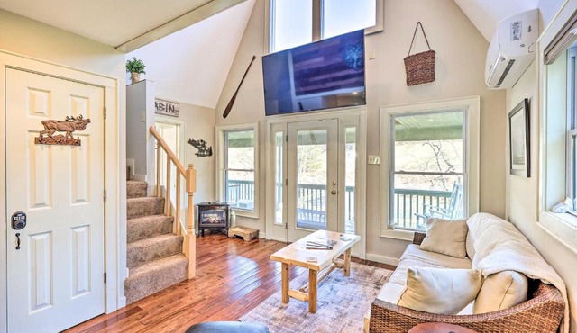 Charming Riverfront Cabin with Yard and Porch!