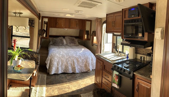 Charming RV Trailer in Country Setting.