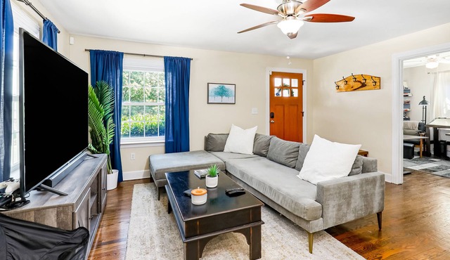 Charming, single-level home with a fenced yard, washer/dryer, & central AC