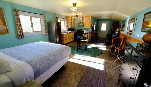 Charming stone clad cabin with views off Highway 140 towards Yosemite