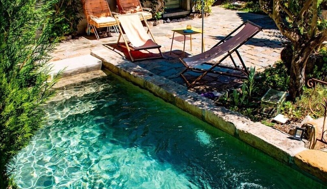 Charming stone house, a peaceful little paradise surrounded by mountains .