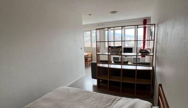 Charming T1 near the thermal baths