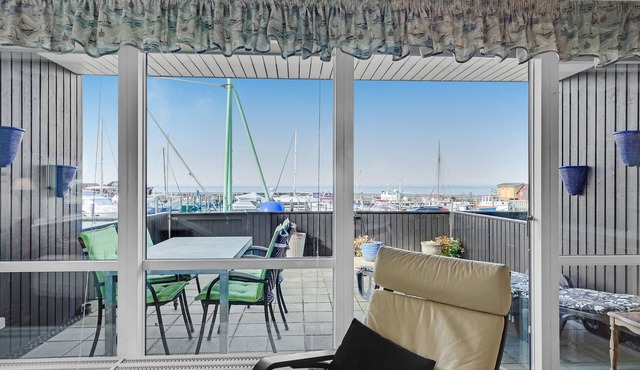 Charming terraced house in the harbor of Lohals, 20 m from the dock.