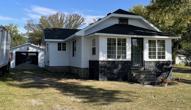 Charming two bedroom on the corner, newly renovated with a sweet porch.