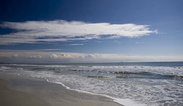 Charming Two Bedroom First Floor Condo Close To Tennis, Golf, and The Beach.