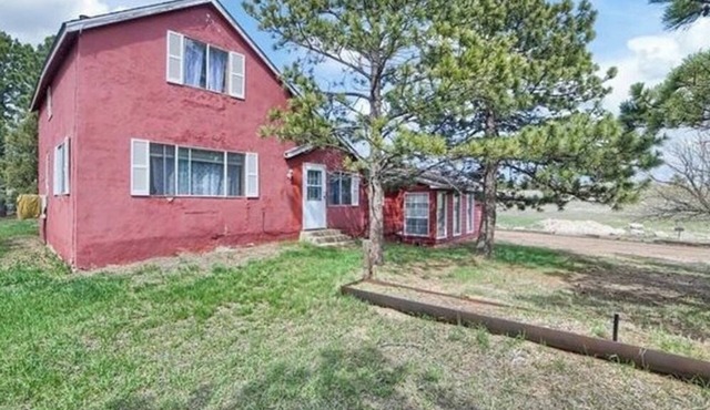 Charming updated 1889 farmhouse in serene Monument Colorado.