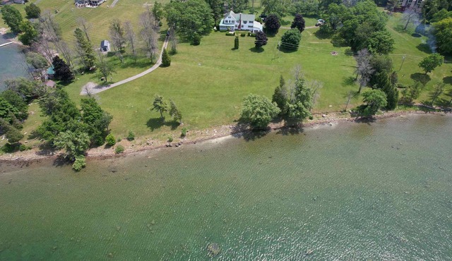 Charming Victorian 2BR Retreat with Porch & Dock – St. Lawrence Riverfront