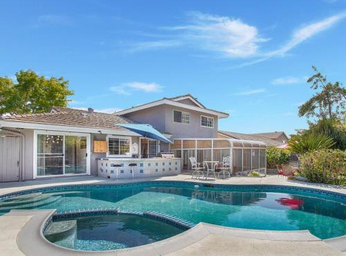 Charming Villa with Backyard Oasis Close to Beach