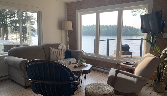 Charming Waterfront Cottage and Guest House with Private Beach.