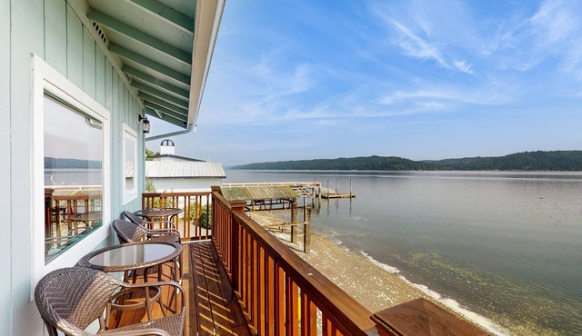 Charming water front home with amazing views, fire pit, and private deck