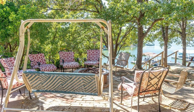 Charming Waterfront Lake Nocona House Cozy 2BR, 2BA lake house with 3 beds + futon on Lake Nocona. Vintage charm meets modern amenities. Enjoy a fully equipped kitchen, multi-level patio with lake views, outdoor seating, grill, and fire pit.