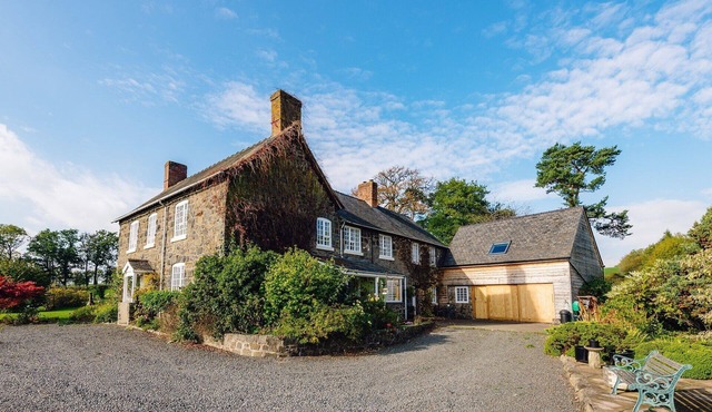 Charming Welsh Farmhouse, natural swimming pool, fabulous views, sleeps to 14