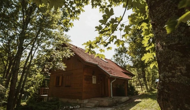 Charming wood house with outdoor hot tub located in National park Plitvice lake.