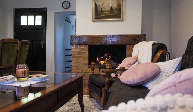 Charming wooden riverside home for peaceful family stay and nature escape.