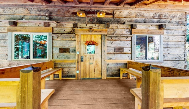 Charming woodland cottage with 2 covered porches, wood stove, treehouse, firepit