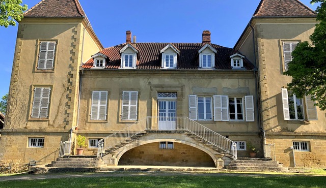 Château on a hill surrounded by its own land overlooking the countryside