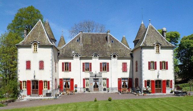 Chazelles Castle from the 17th century in a park with swimming pool.
