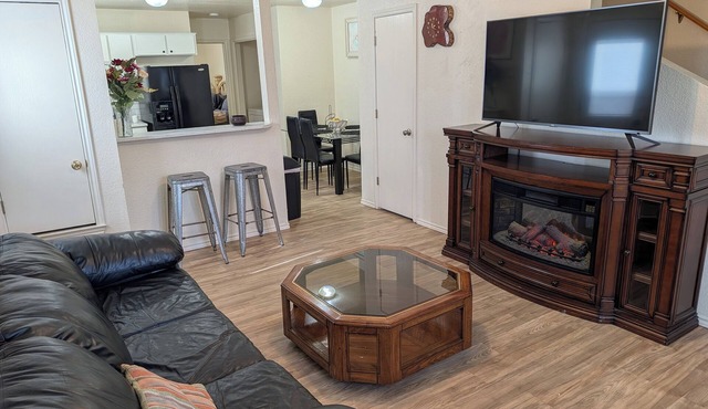 Cheerful 3-bedroom with fenced backyard.