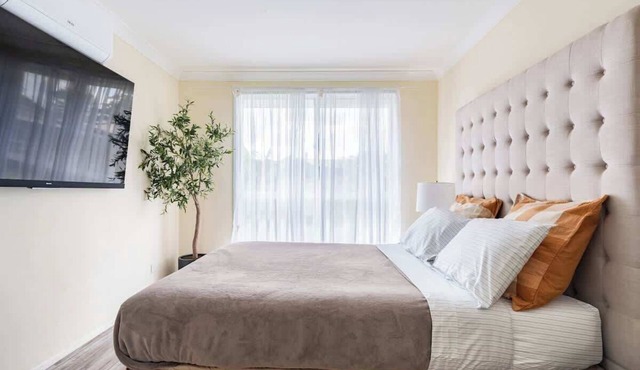 Cheerful 4 bedroom home with parking on premises