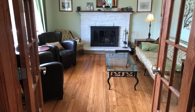 Cheerful 4 bedroom house with large deck and garden in walkable neighbourhood.