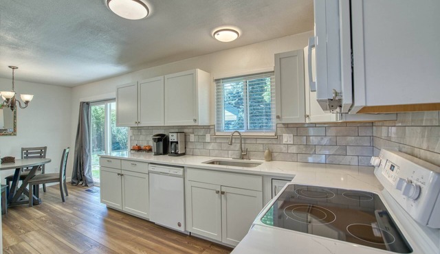 Cheerful CO roomy home with fenced yard
