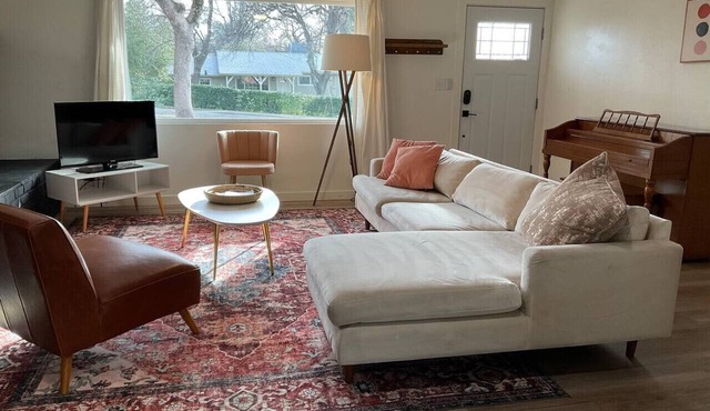 Cheerful Three Bedroom Home with a Fireplace