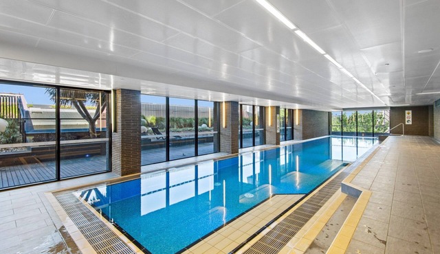 Chic 1-Bed with Balcony Views and Amenities